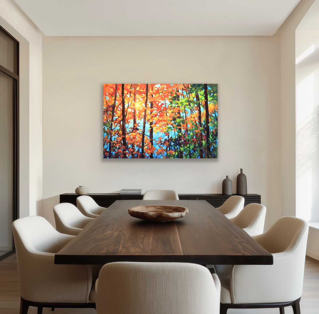 large original painting with autumn trees in a dining room